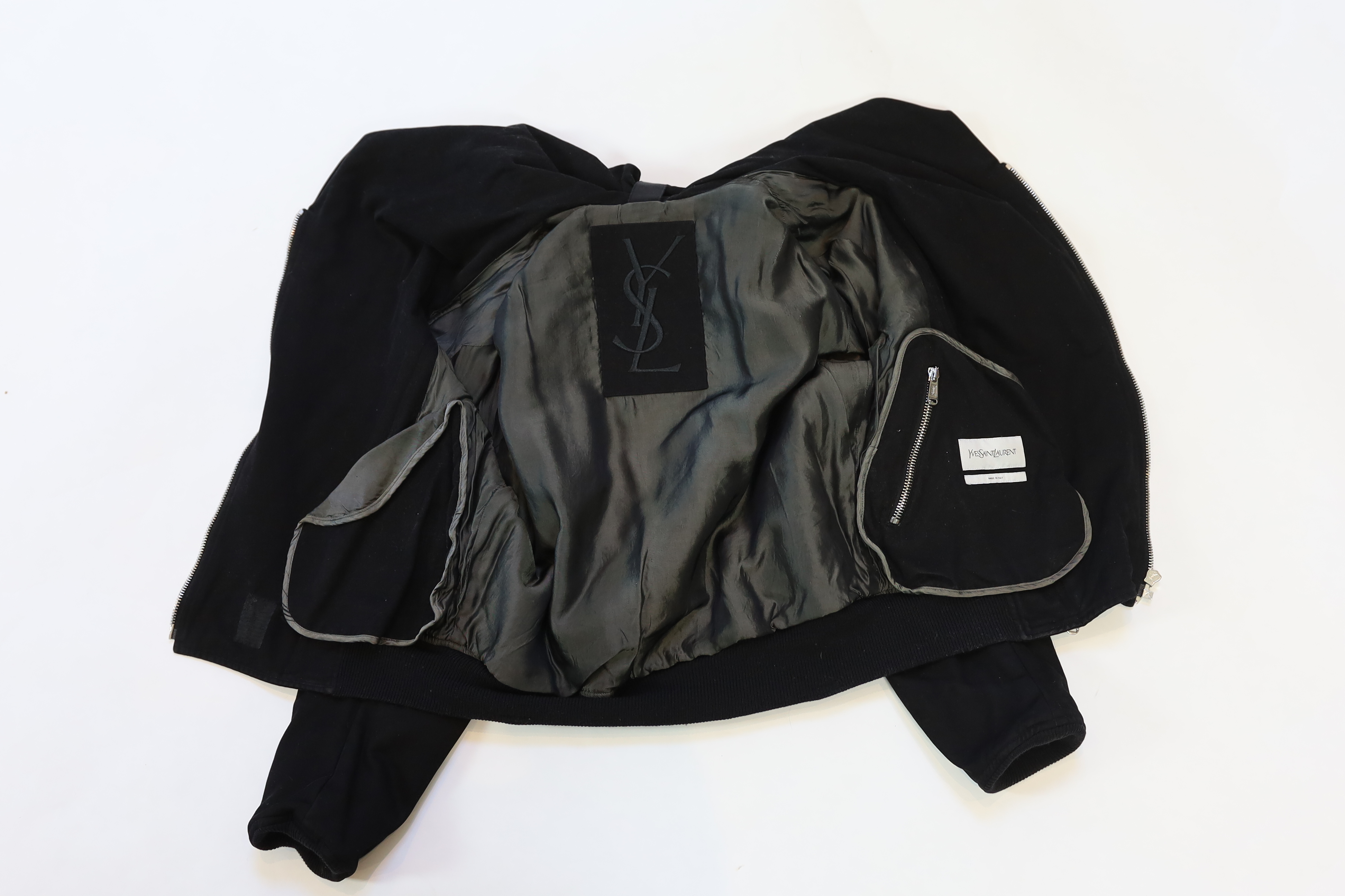 A vintage Yves Saint Laurent lady's hooded black double zipped bomber jacket, size 10-12